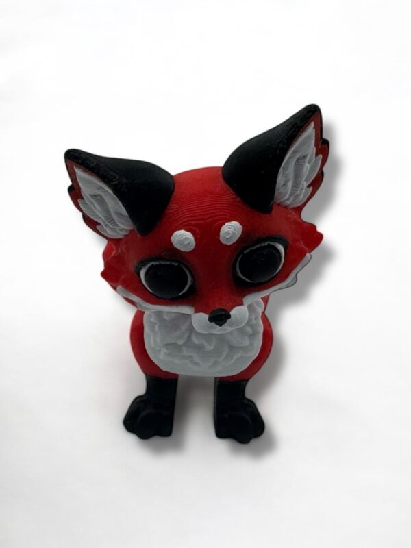 3D printed articulated fox toy with big eyes and movable joints